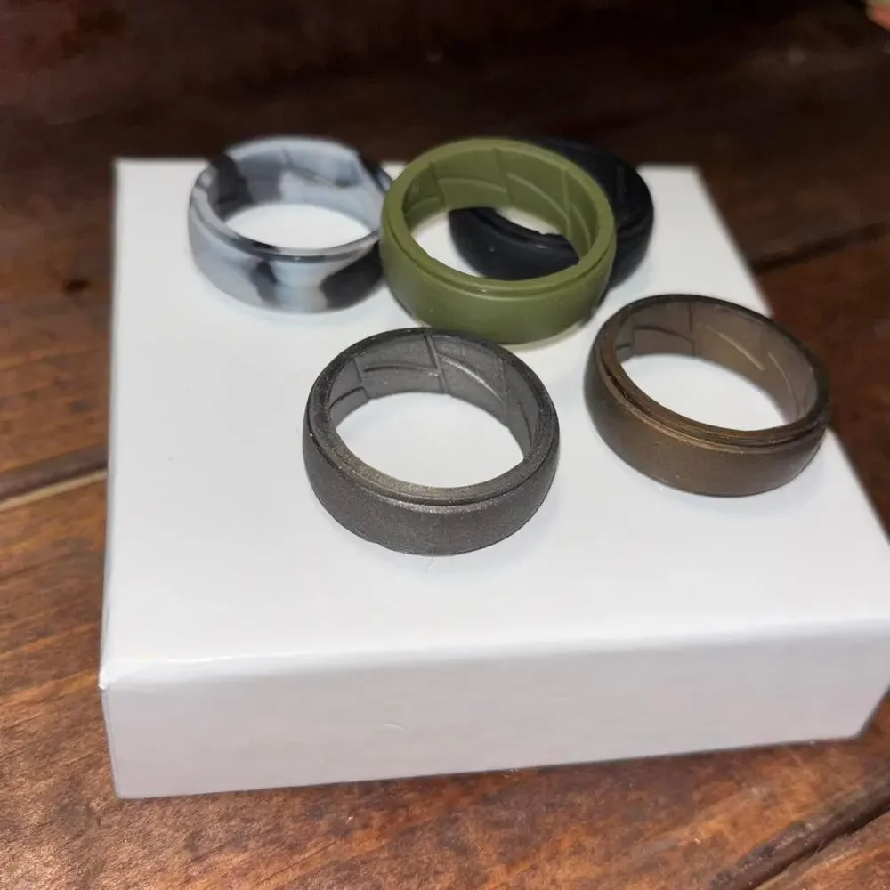 New in box silicone rings size 13.5 /14